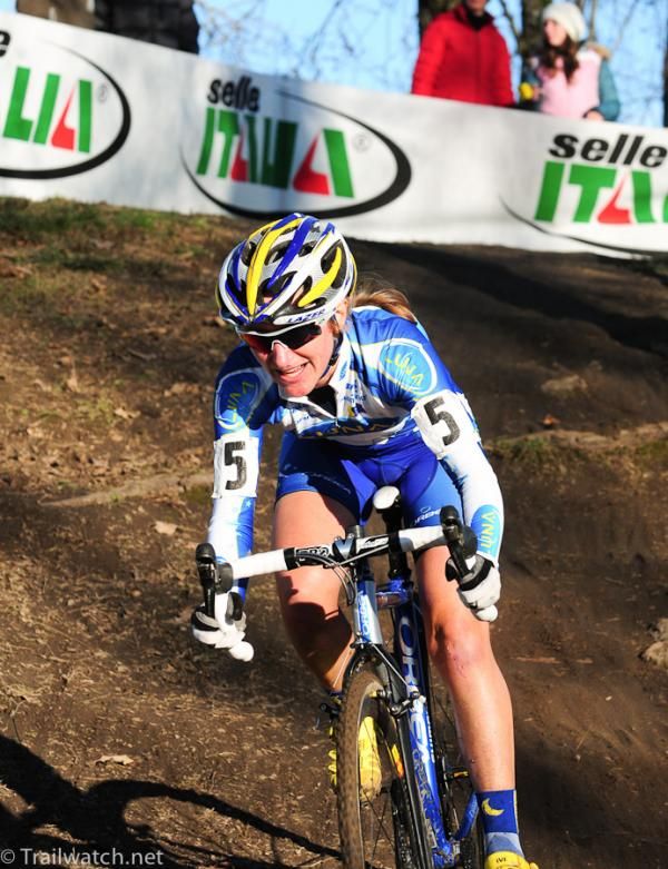 Amy Dombroski (Luna Pro Team) riding alone in third place.
