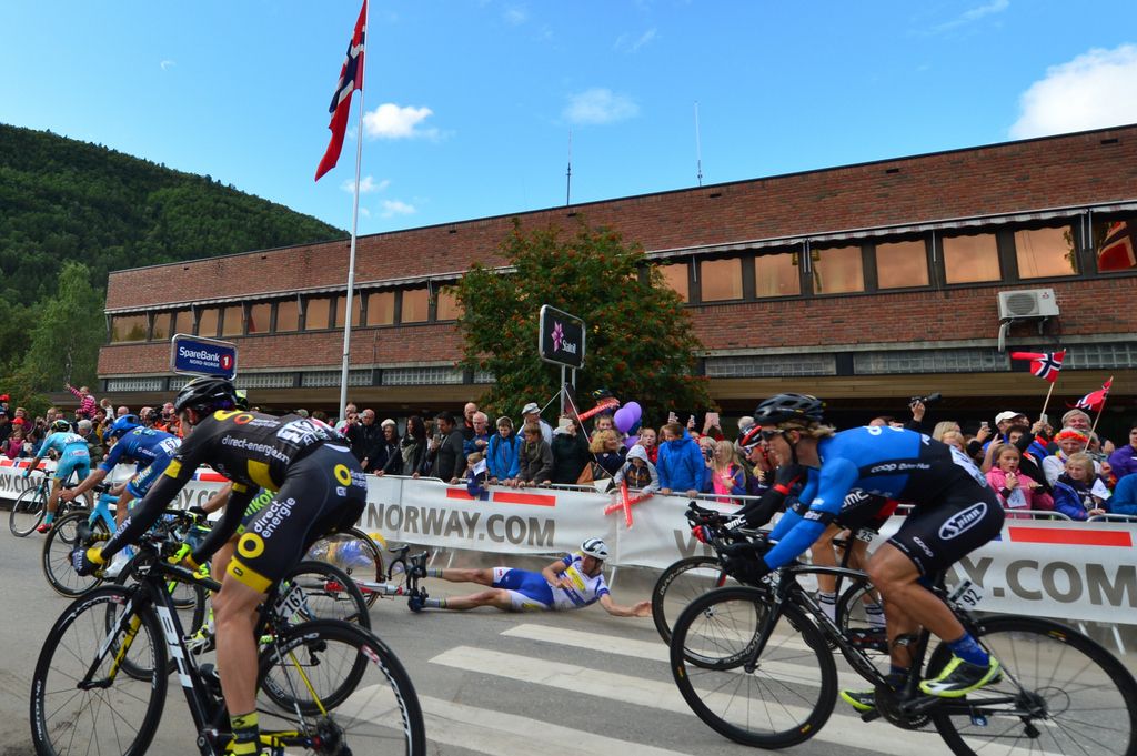 Riders try to avoid the fallen riders