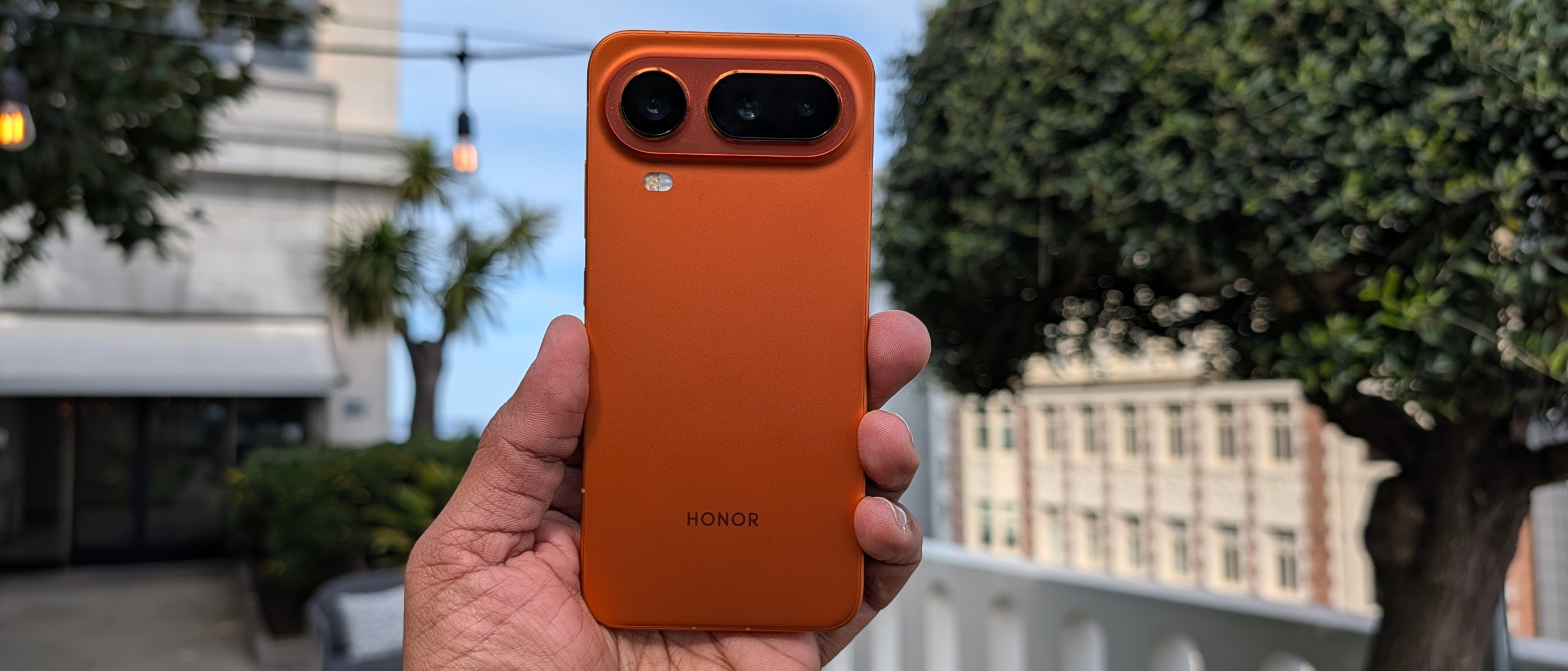 Holding the Honor Magic 8 Pro Air