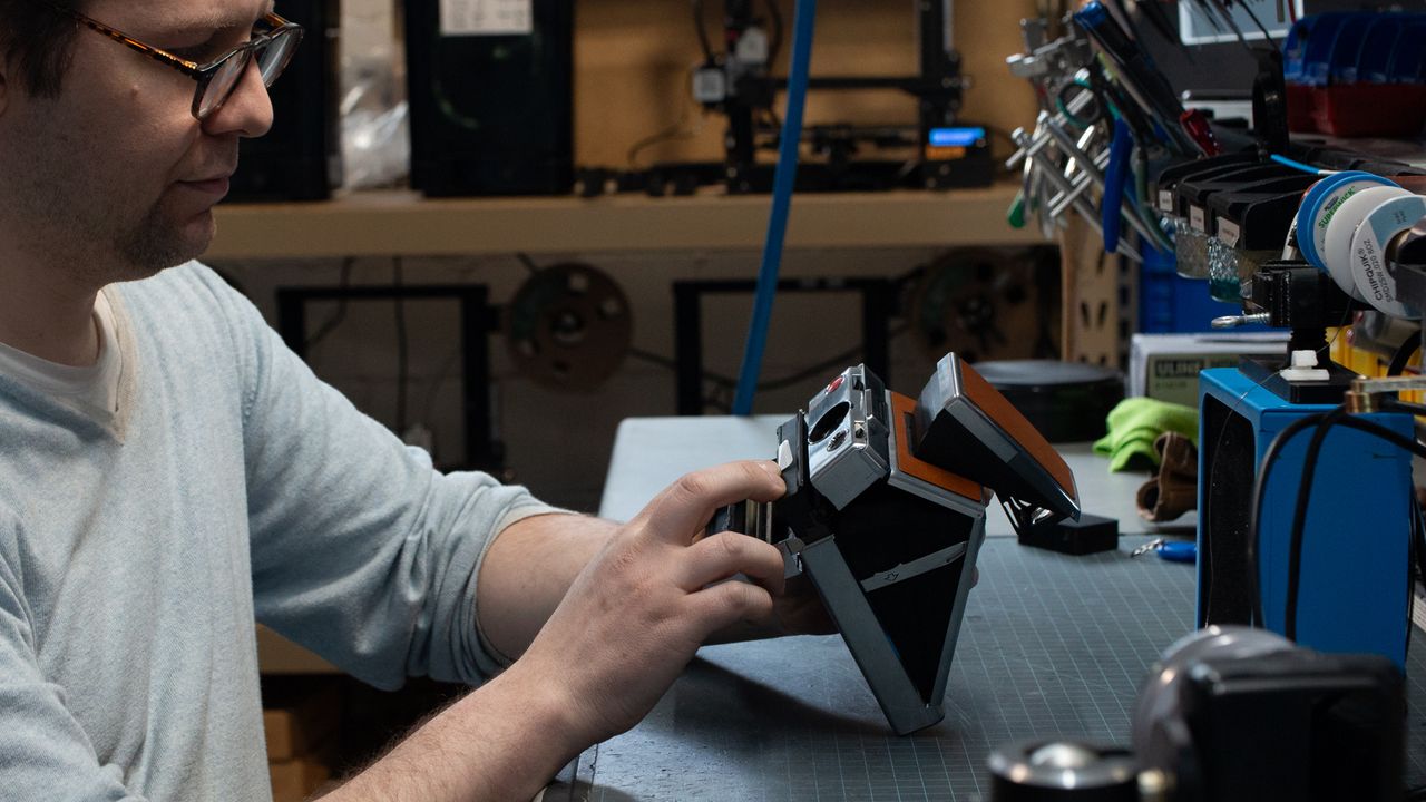 Tear down of the Polaroid SX-70 camera in the Retrospekt workshop during a refurbish
