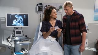 Carmen shows Johnny the ultrasound scan of their baby in Cobra Kai season 5