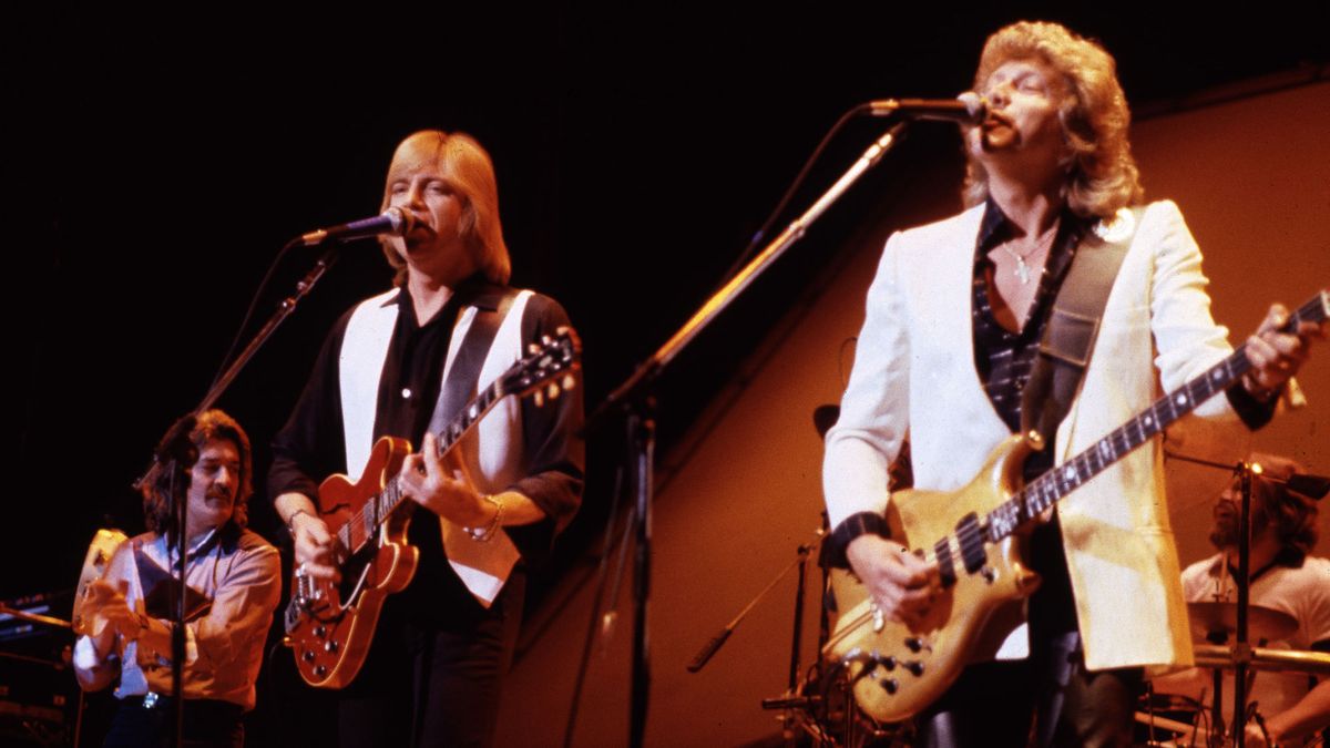 Moody Blues perform on stage, 1981, L-R Ray Thomas, Justin Hayward, John Lodge.