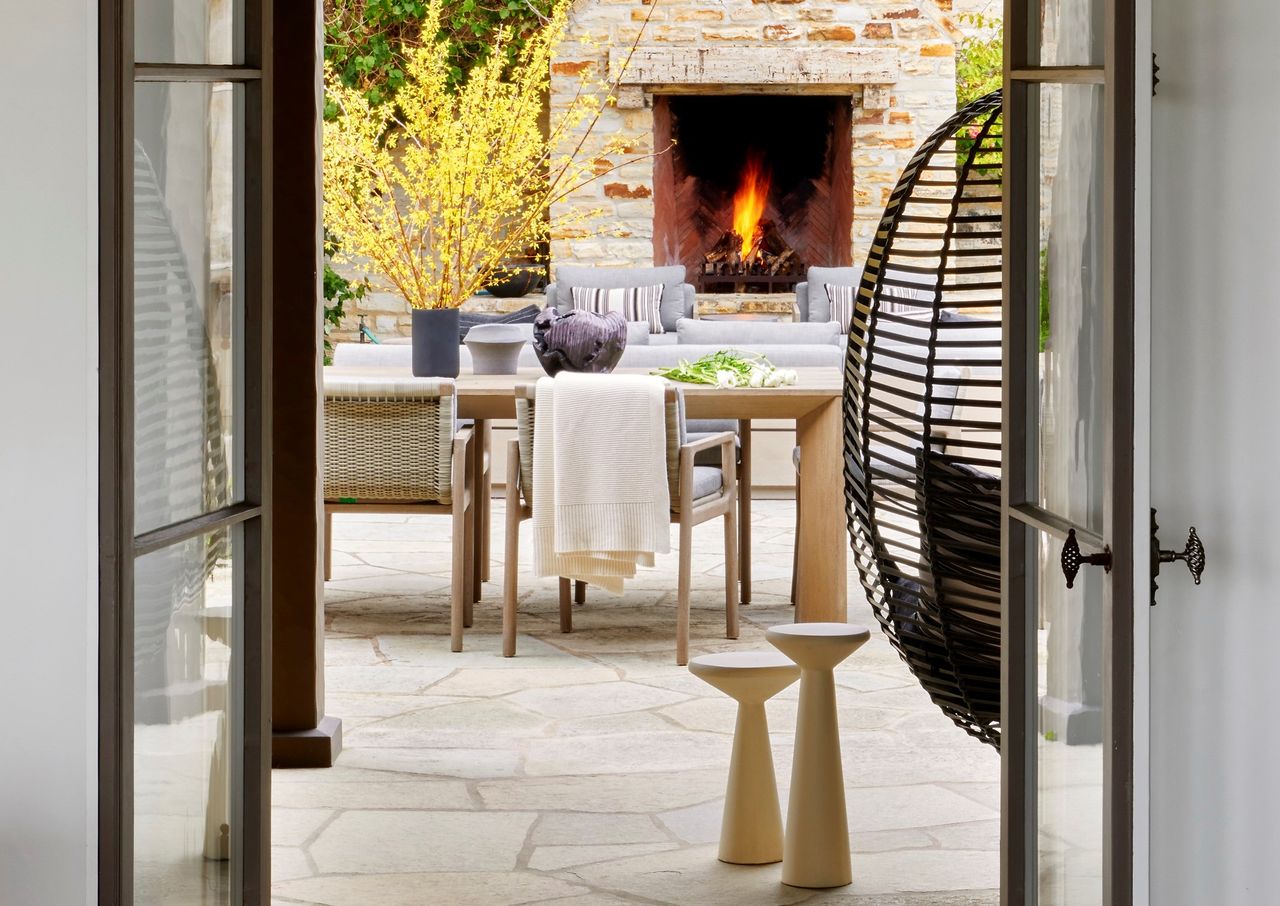 An outdoor space with a fireplace