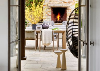 An outdoor space with a fireplace