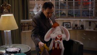 Alan Tilvern offers his handkerchief to a crying Roger Rabbit in Who Framed Roger Rabbit.