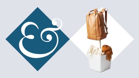 A white YAMAZAKI Home Tower Home Backpack Stand in a white diamond, beside a dark blue diamond with a white & inside.