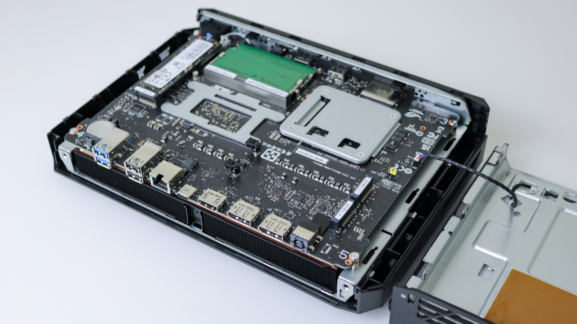 An overhead shot showing the two free M.2 SSD slots and the other internals of the Asus ROG NUC 970