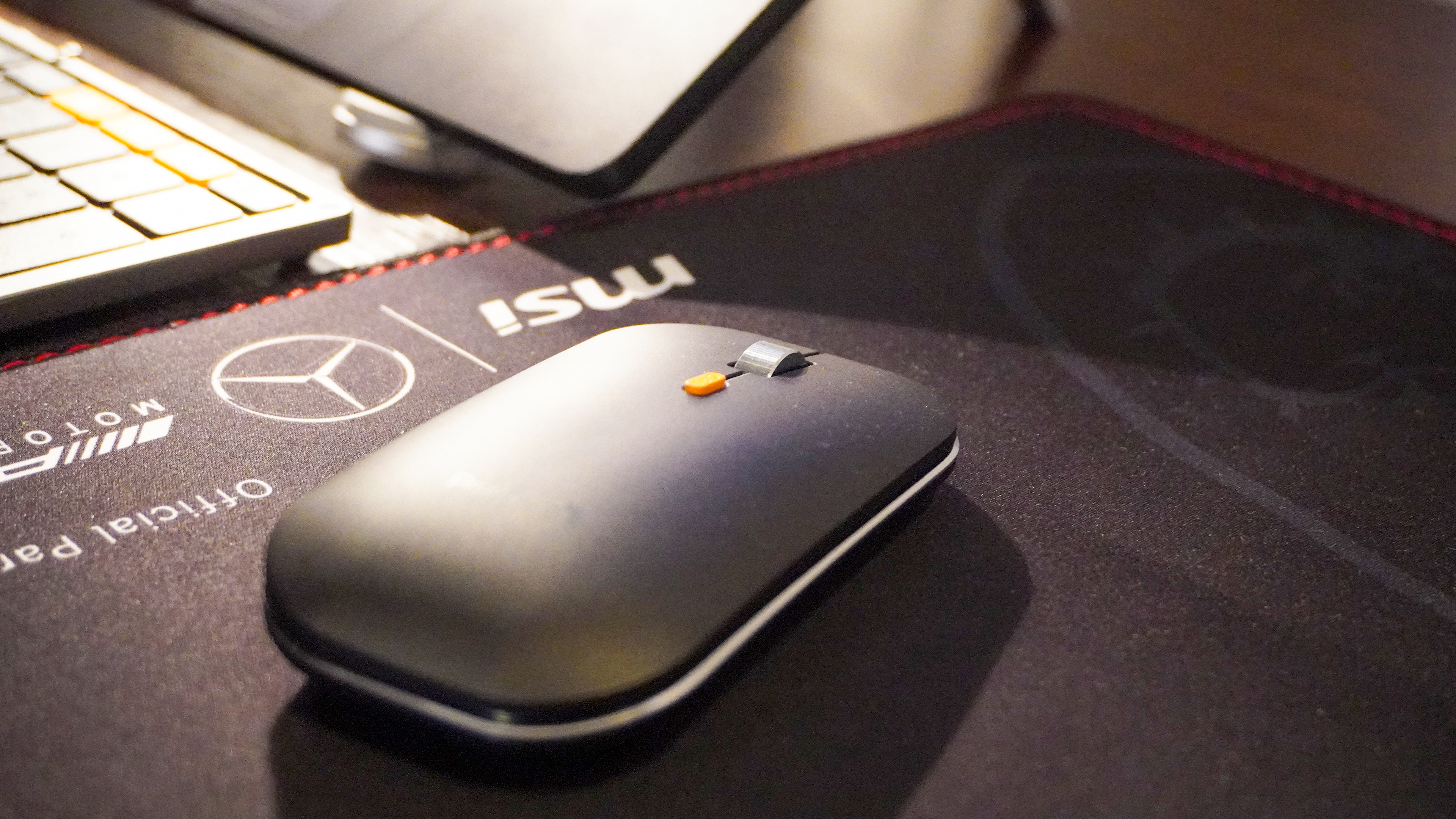 ProtoArc XKM01 wireless mouse on a mat