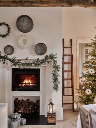 Christmas fireplace decorations with minimalist style by The White Company