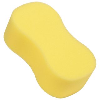 A yellow cleaning sponge