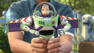 Andy holding Buzz Lightyear up for Bonnie in Toy Story 3