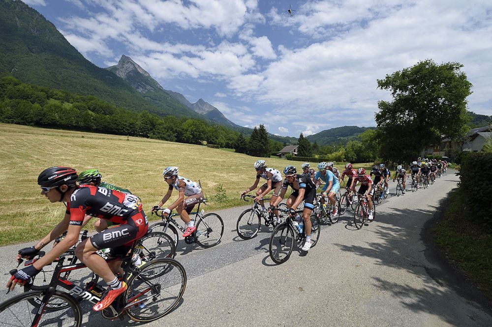 The pack rides during the 131.5 km first stage of the 67th edition of the Criterium Dauphine.