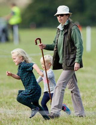 Princess Anne outdoors with Savannah and Isla Phillips