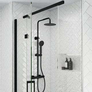 White shower room with matte black shower and clear glass shower screen
