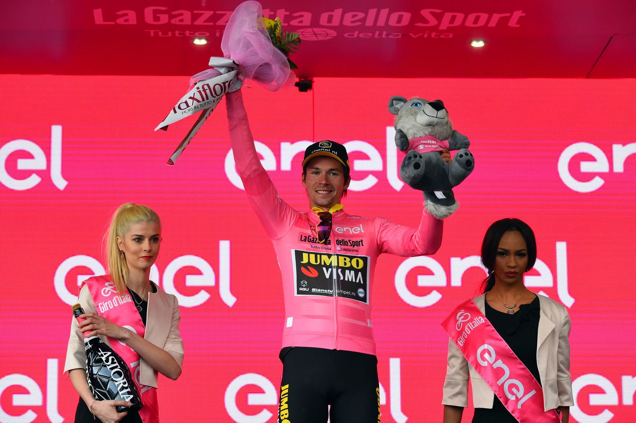 Roglic celebrates keeping pink for another day