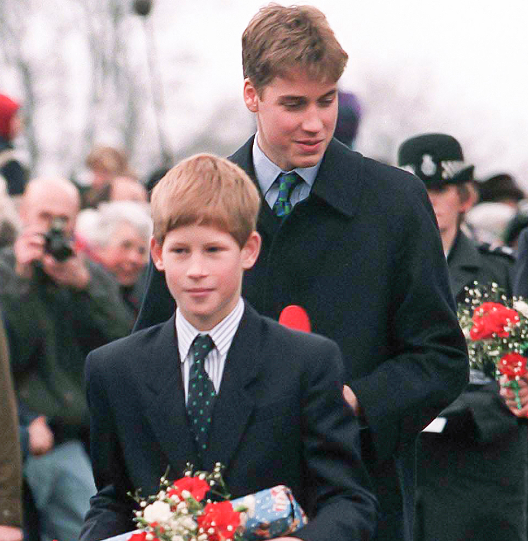 Prince Harry and Prince William holding gifts