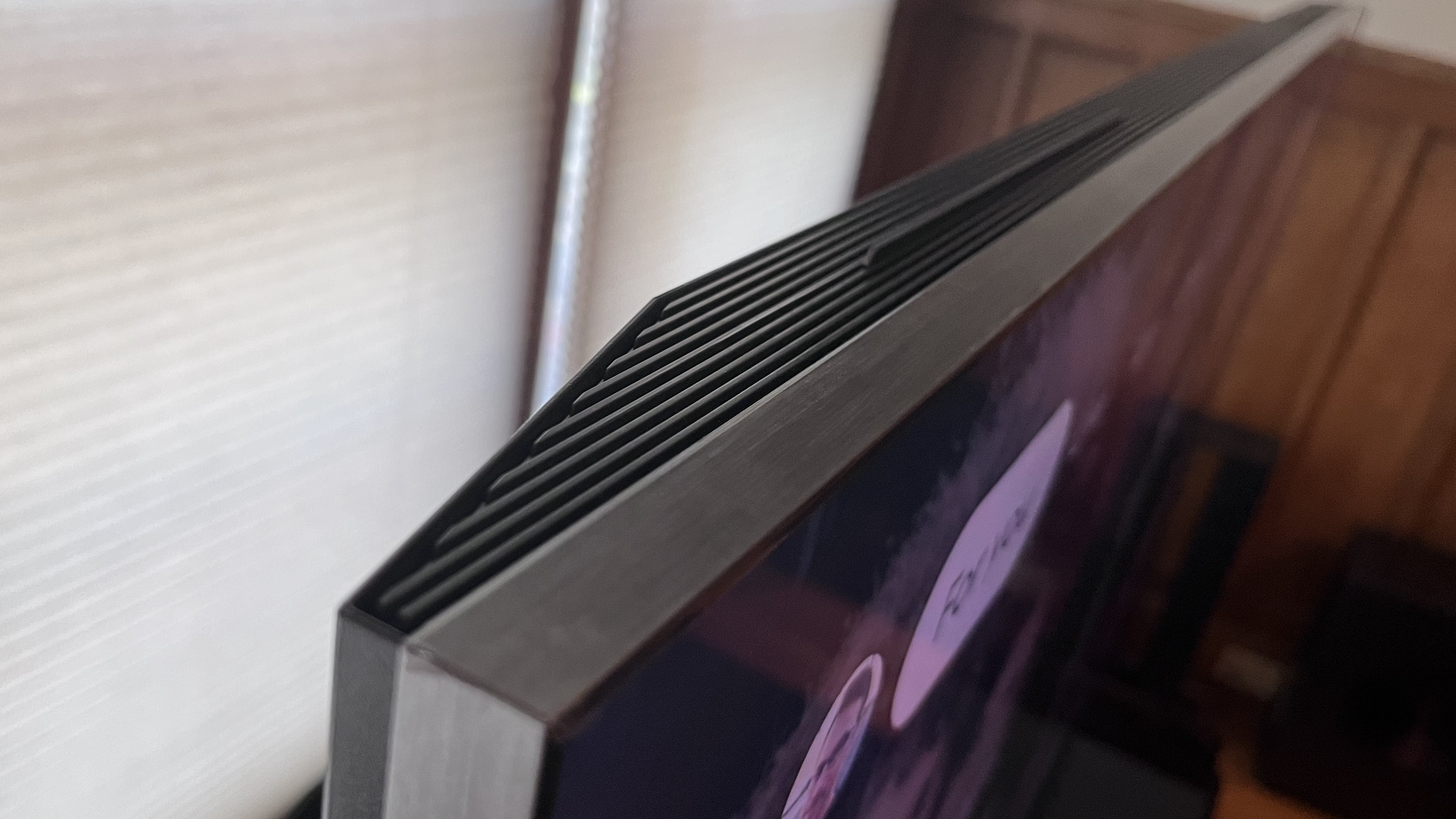 TCL QM8K bezel shown from top
