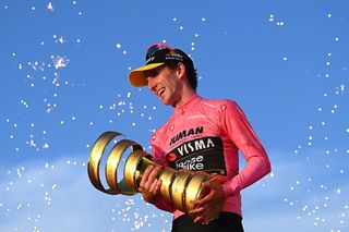 ROME ITALY JUNE 01 Simon Yates of Great Britain and Team Visma Lease a Bike celebrates at podium as Pink Leader Jersey winner with the Trofeo Senza Fine during the 108th Giro dItalia 2025 Stage 21 a 1448km stage from Rome to Rome UCIWT on June 01 2025 in Rome Italy Photo by Tim de WaeleGetty Images