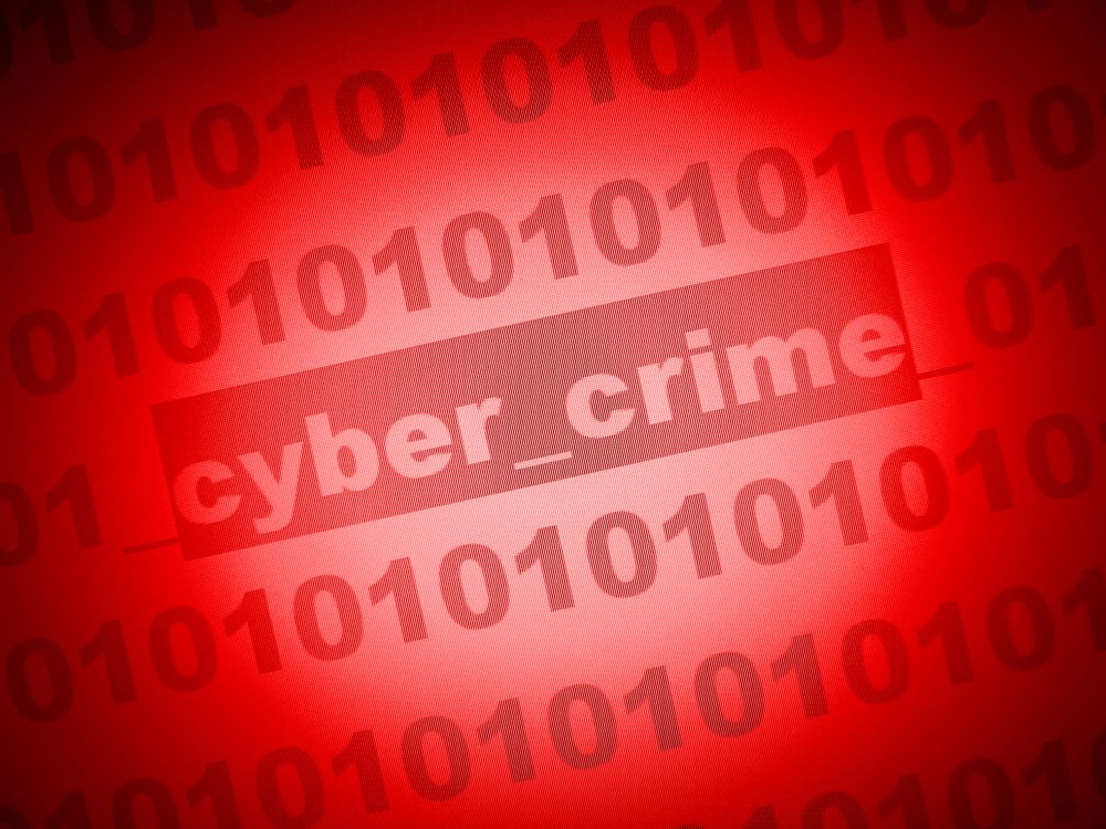 Cyber crime posted within binary code 