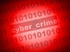 Cyber crime posted within binary code