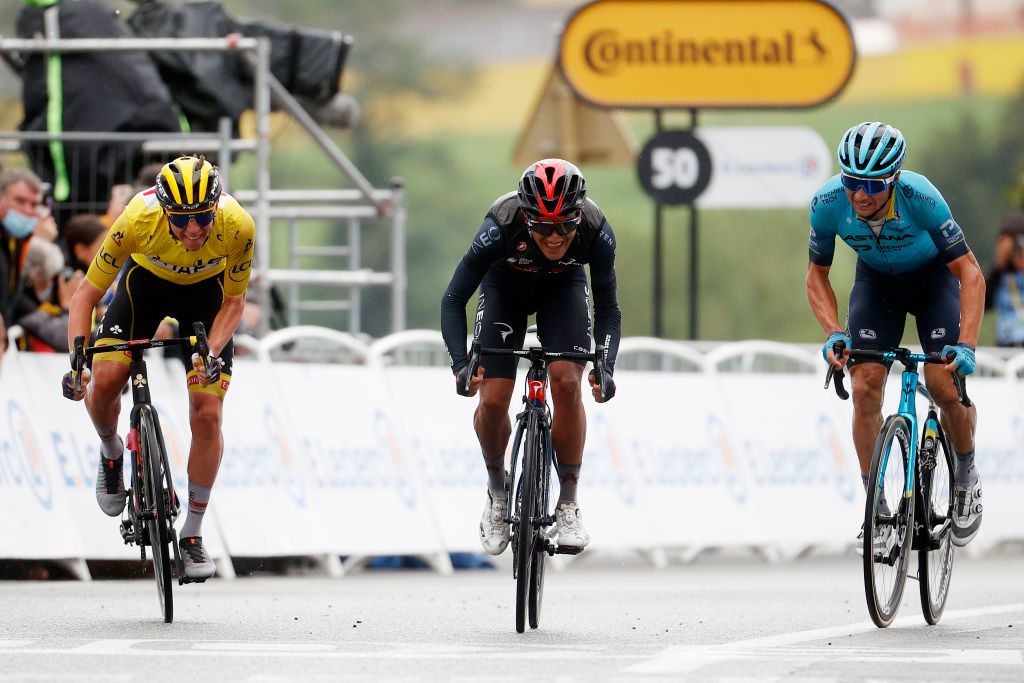 SAINTGAUDENS FRANCE JULY 13 Tadej Pogaar of Slovenia and UAETeam Emirates yellow leader jersey Richard Carapaz of Ecuador and Team INEOS Grenadiers Alexey Lutsenko of Kazakhstan and Team Astana Premier Tech at arrival during the 108th Tour de France 2021 Stage 16 a 169km stage from Pas de la Casa to SaintGaudens LeTour TDF2021 on July 13 2021 in SaintGaudens France Photo by Chris GraythenGetty Images