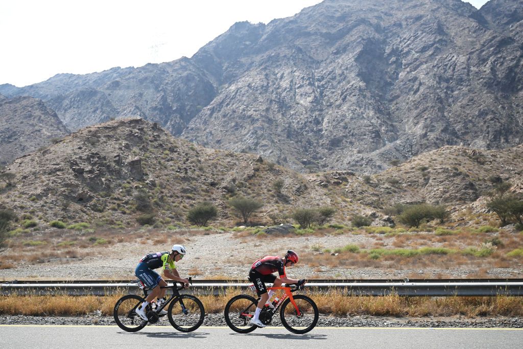 QIDFA UNITED ARAB EMIRATES FEBRUARY 20 A general view of Michael Shea Leonard of Canada and Team INEOS Grenadiers and Djordje Djuric of Serbia and Team Solution Tech Vini Fantini compete in the breakaway during the 7th UAE Tour 2025 Stage 4 a 181km stage from Fujairah Qidfa Beach to Umm al Quwain UCIWWT on February 20 2025 in Fujairah Qidfa Beach United Arab Emirates Photo by Dario BelingheriGetty Images