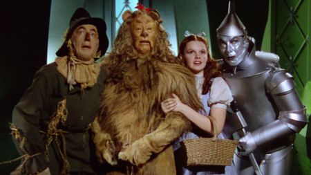 Scarecrow, Cowardly Lion, Dorothy, and Tin Man in The Wizard of Oz
