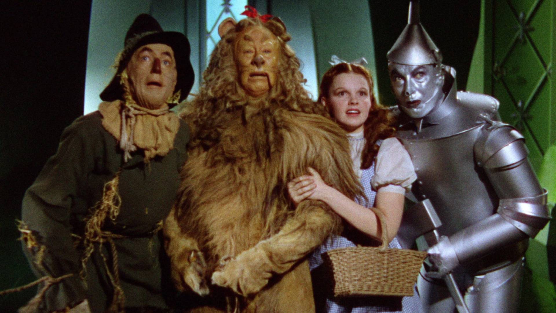 Scarecrow, Cowardly Lion, Dorothy, and Tin Man in The Wizard of Oz