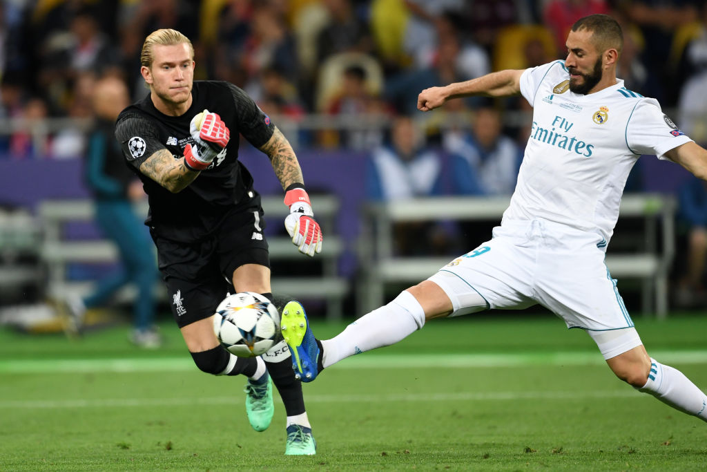 Loris Karius rolls the ball onto the leg of Real Madrid's Karim Benzema in the 2018 Champions League final