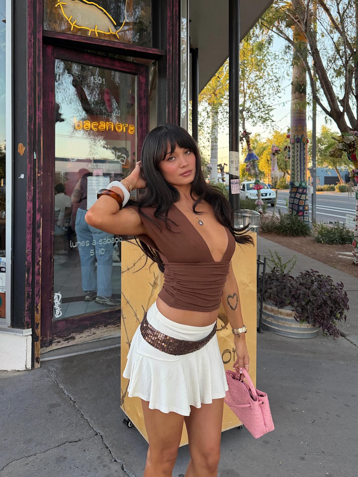 A woman wearing beaded skirt trend for summer 2026.