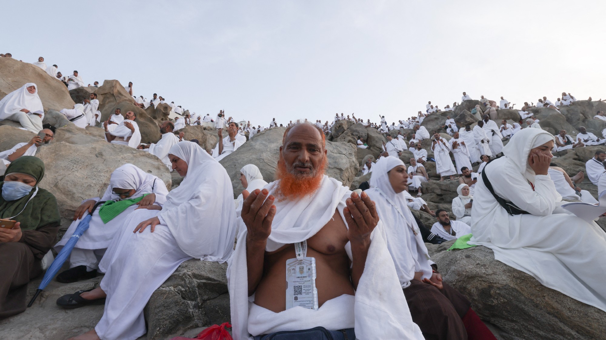 Muslim pilgrims pray at dawn on Saudi Arabia's Mount Arafat during the climax of the Hajj pilgrimage