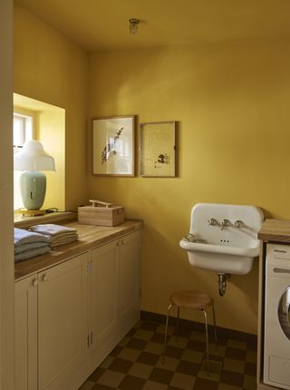 yellow utility room in Farrow & Ball Babouche