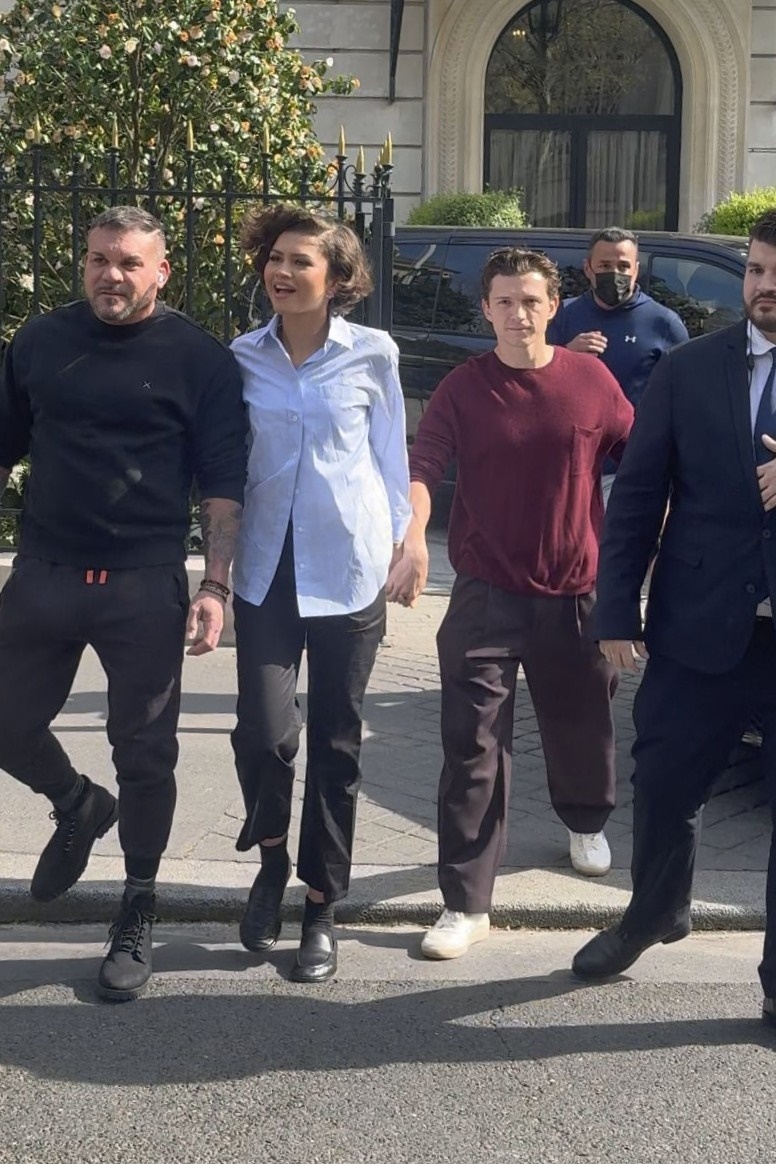 Zendaya and Tom Holland were spotted in Paris, Z borrowed from the boys in a button-down, trousers, and leather loafers