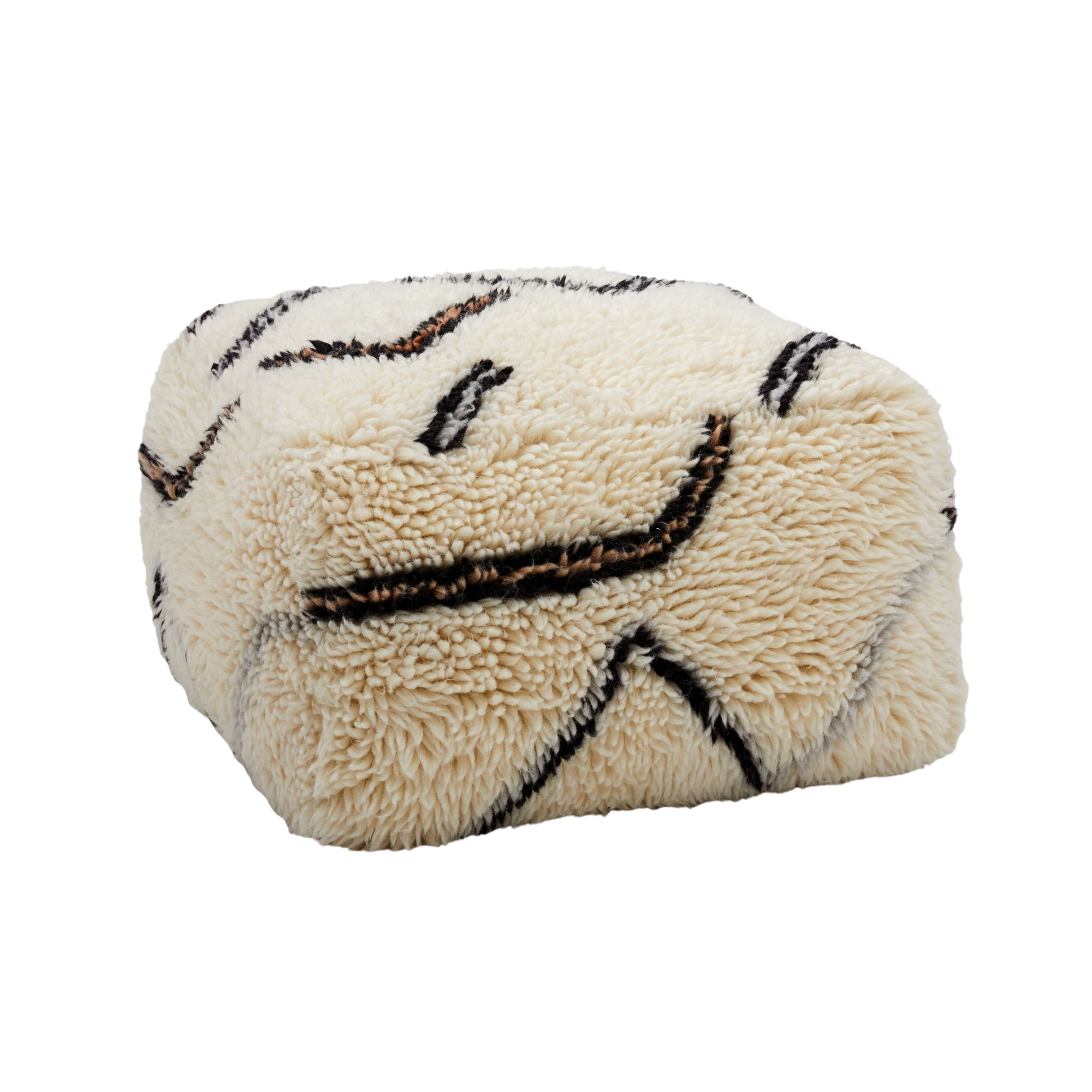 a shag pouf in white with an abstract design