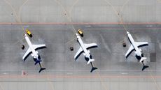 Birds-eye image of two planes on a run way
