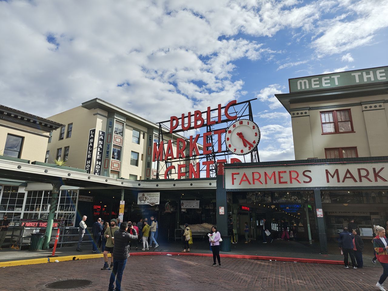 A red Public Market Center sign