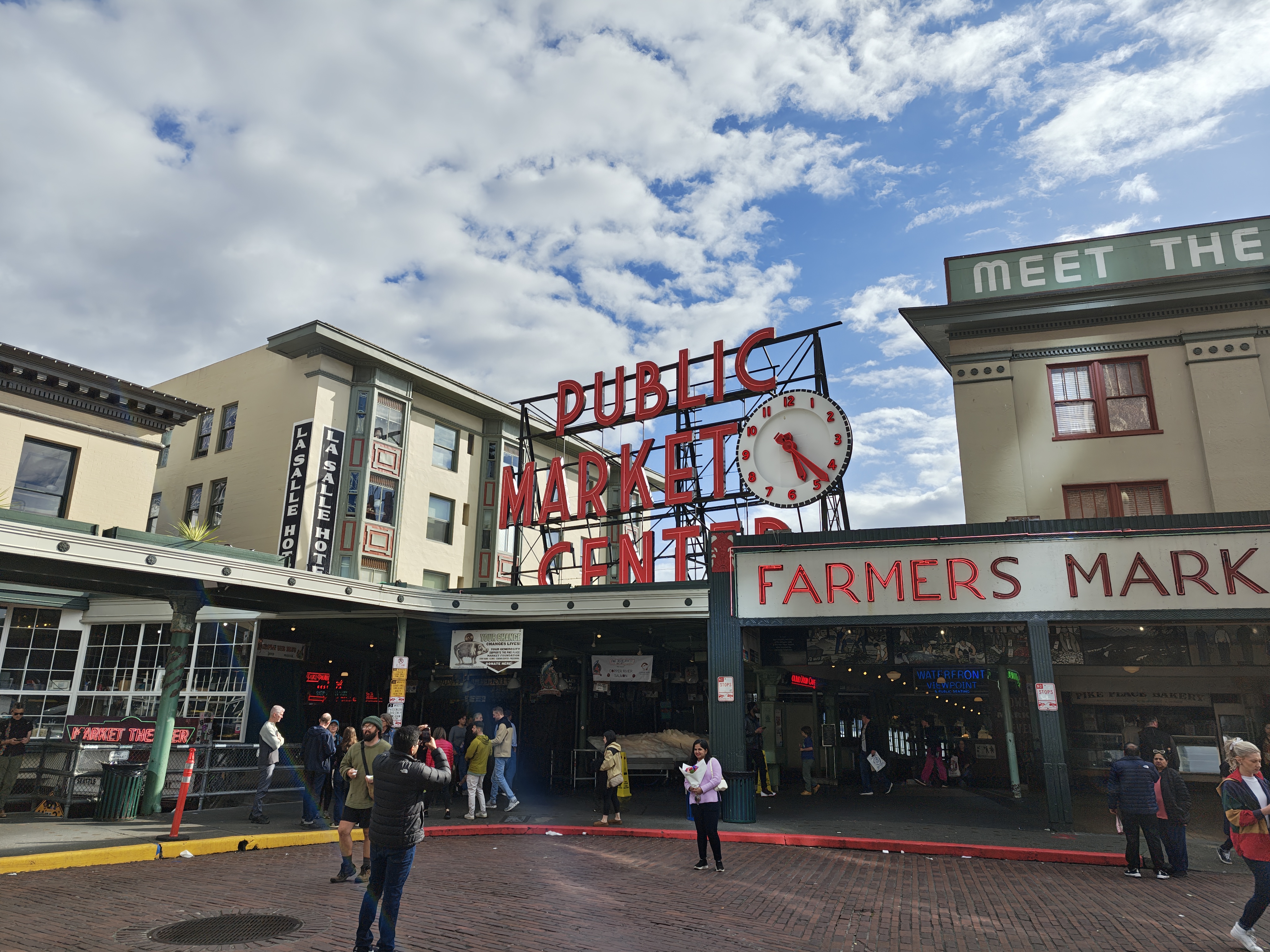 A red Public Market Center sign