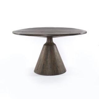 A wooden dining table from Magnolia