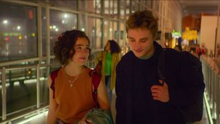 Haley Lu Richardson and Ben Hardy in an airport in Love At First Sight