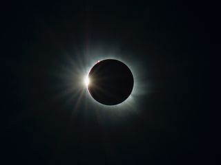 A "diamond ring," which occurs seconds before or after totality during a total solar eclipse, captured by Kevin Morefield.