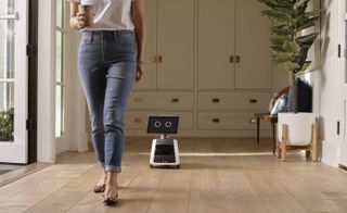 Amazon Astro home robot following woman