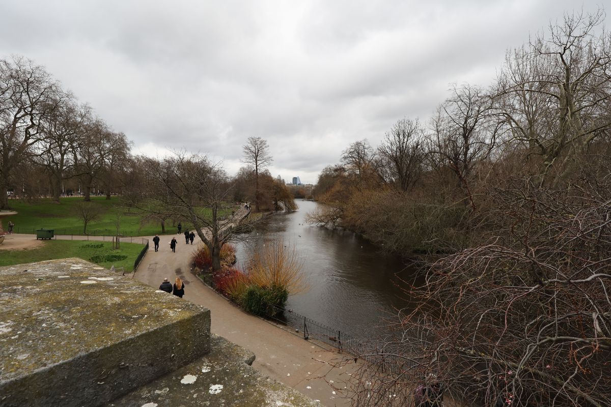 Path and a river running through a park