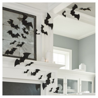 Felt bats on a mirror