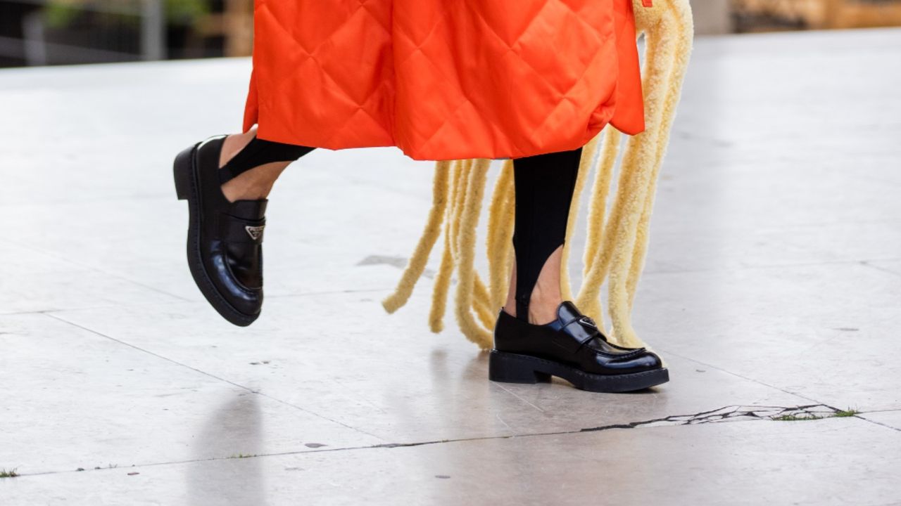 Loafers - woman wearing Prada Loafers at fashion week