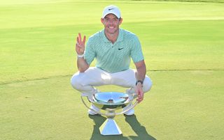 Rory McIlroy holds up three fingers after his third FedEx Cup victory in 2022