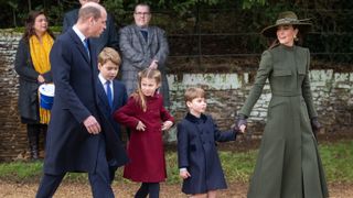 Prince William, Prince of Wales, Prince George, Princess Charlotte, Prince Louis and Catherine, Princess of Wales attend the Christmas Day service in 2022