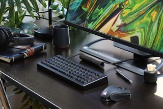 Drop CSTM65 Mechanical Keyboard on a computer desk in black
