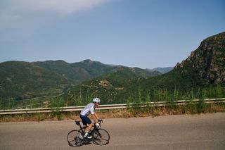 Male cyclist riding in Sardinia