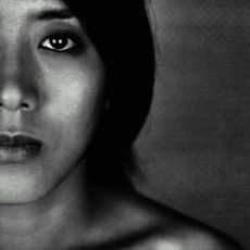 Black and white photograph of sad woman
