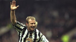 Alan Shearer celebrates after scoring a goal for Newcastle United